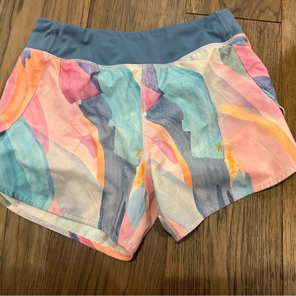 ATHLETA GIRL RUN THE WORLD 3" SHORT
